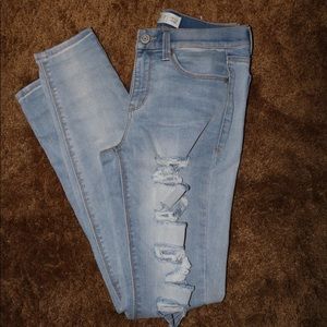 Low-rise skinny ripped jeans